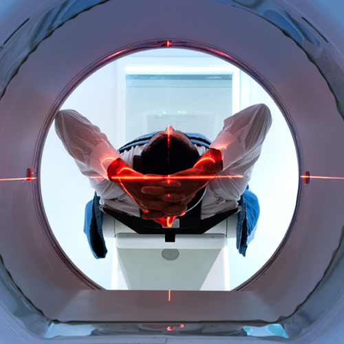 Person entering an MRI machine.