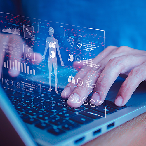 Visualization of health data projected above a close-up of a person's hands typing on a keyboard.