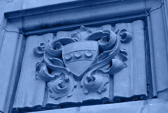 Architectural detail of the Penn Shield with filigree.